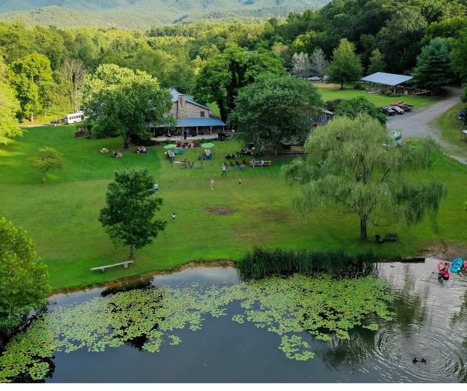 Aerial view of the pond, gazebo and surrounding lawn at Wilderness Adventure